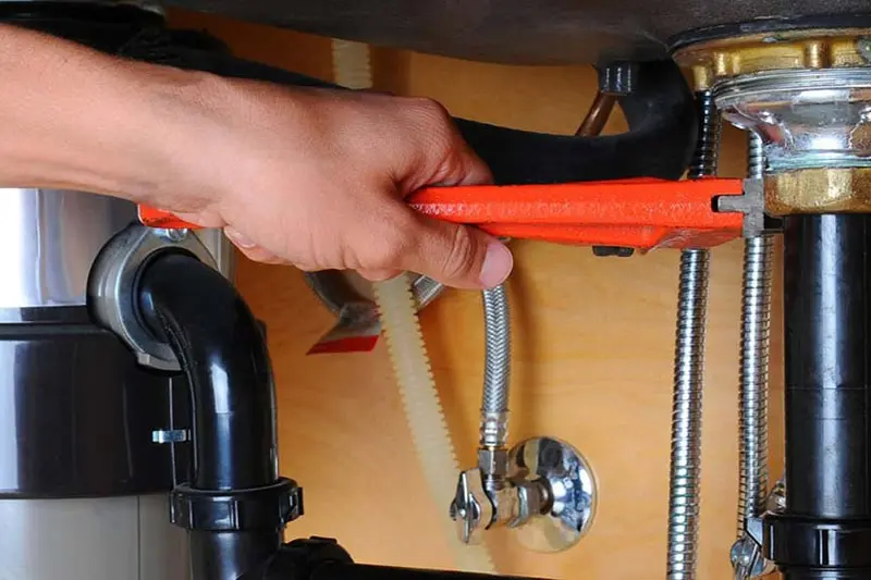 garbage disposal repair same day by technician in Salem